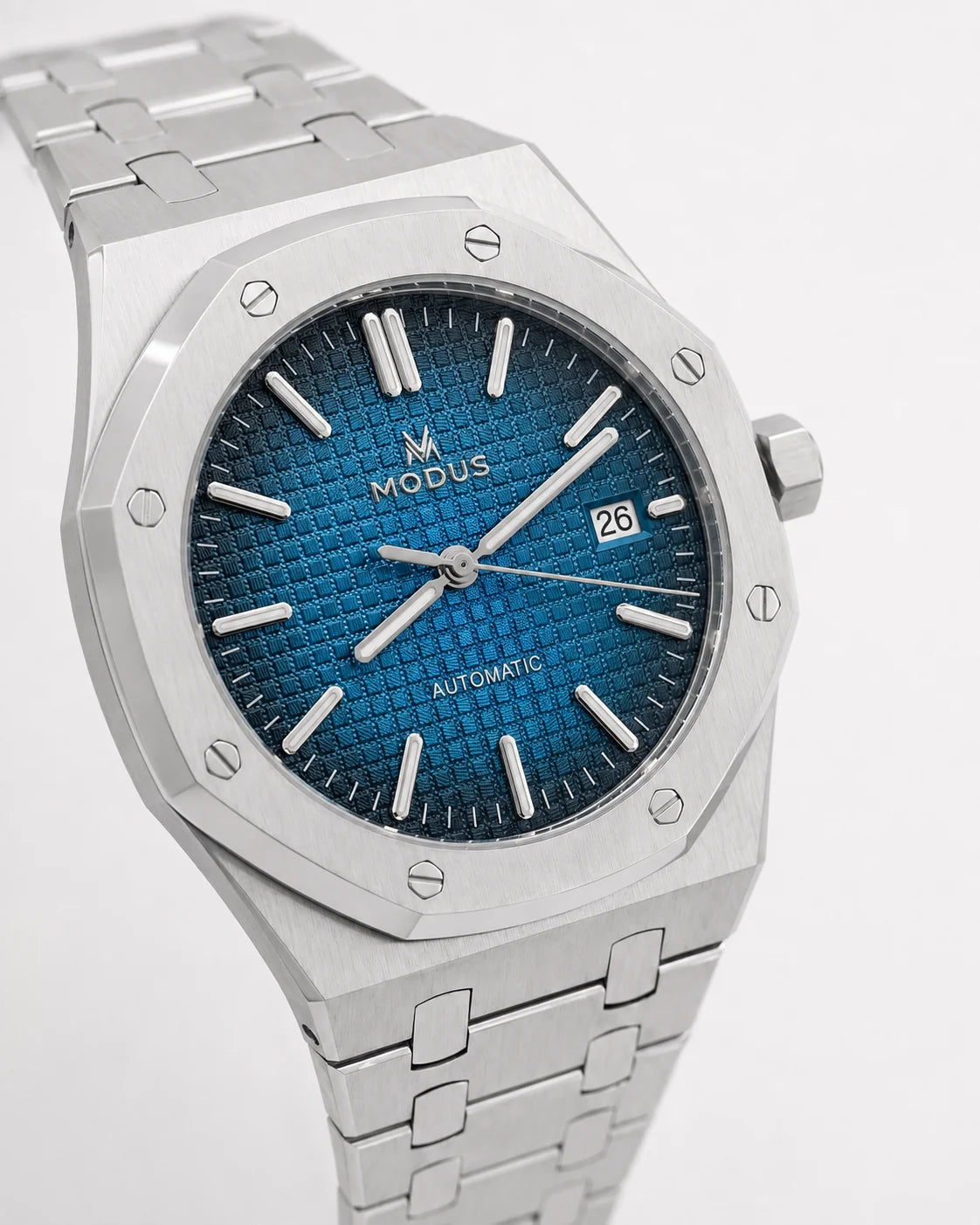 ORBIT · Automatique · Bleu — trois quarts, boîtier octogonal et bracelet acier intégré